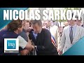 2011 : Nicolas Sarkozy, président de la République, agrippé lors d'un bain de foule | Archive INA