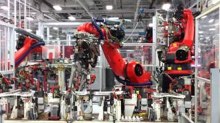 Check out the crazy precision of this assembly line robot at tesla
motors factory in california