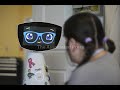 A robot programmed to act like a 7-year-old girl is combatting fear and loneliness in hospitals