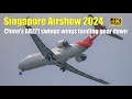 Singapore Airshow 2024: China&#39;s ARJ21 swings wings landing gear down