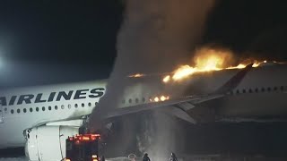 Fiery plane crash at Tokyo