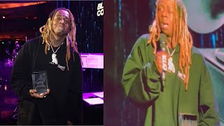 Lil Wayne accepts his Global Impact Award at the Grammys Black Music Collective celebration