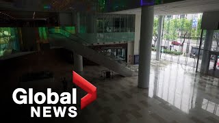 COVID-19: Beijing's malls dark, empty as city's restrictions tighten