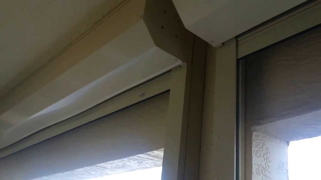 Roll hurricane shutters Miami Florida motorized security and storm