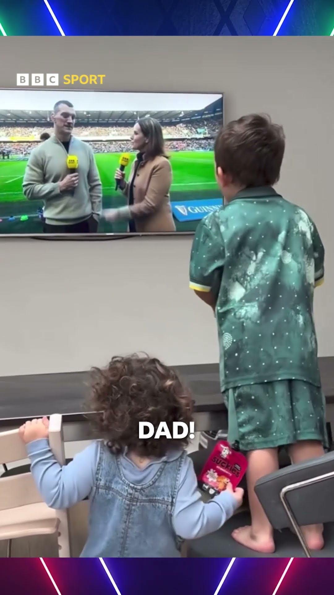 When you spot dad on TV, but he just won't listen!