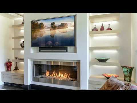 Video: Diseño moderno de chimeneas (foto). diseño de sala con chimenea