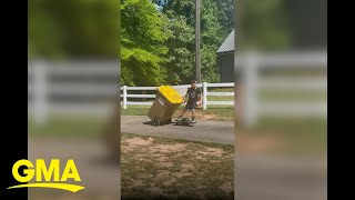 Boy ingeniously uses electric skateboard to take out the garbage