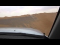 Morocco suv ride over the sand dunes of sahara desert