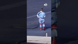 Crews work on DC reflecting pool as Trump touts progress