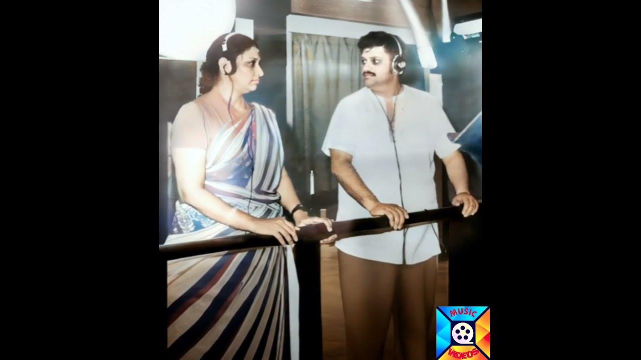Legendary singers Smt. S Janaki & late Sri. SPB prepares for a duet at the studio. Legendary singers Smt. S Janaki & late Sri. SPB prepares for a duet at the studio.