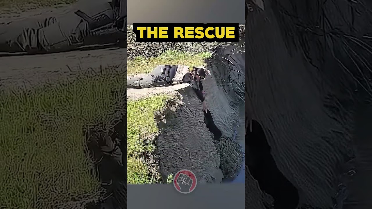Riveting Rescue: Sheriff's Brave Effort to Save Dog on a Slide by the River 🐶🌊 #shorts