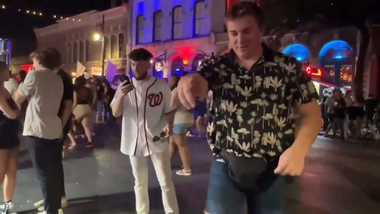 heelmike's cameraman gives his paycheck to a homeless man