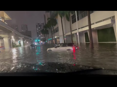 Watch: Flooding from tropical system leaves multiple cars stuck in Florida