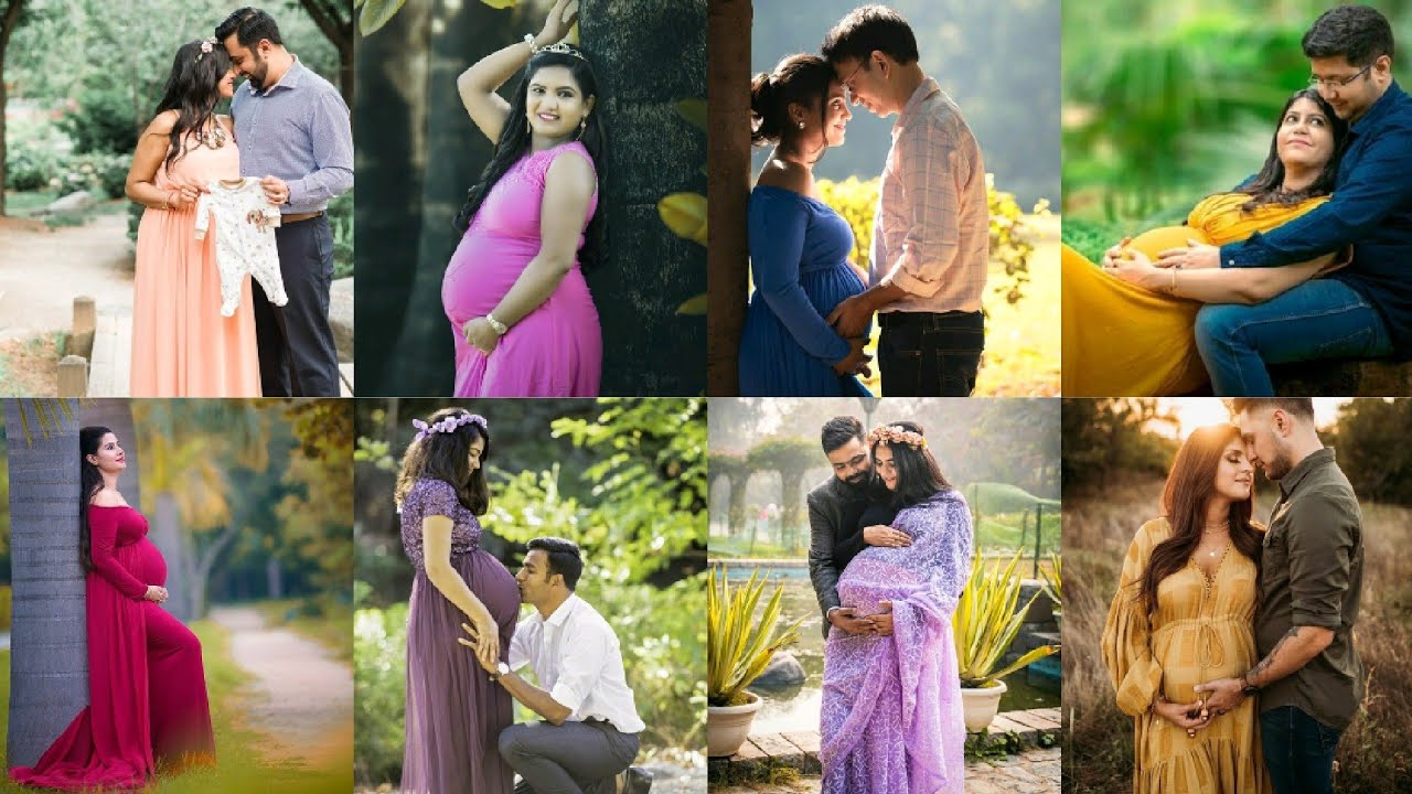 Indian couple posing for maternity baby shoot. The couple is posing in a  lawn with green grass and the woman is falunting her baby bump in Lodhi  Garden in New Delhi, India