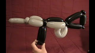 Learn how to make a machine gun using balloon twisting.