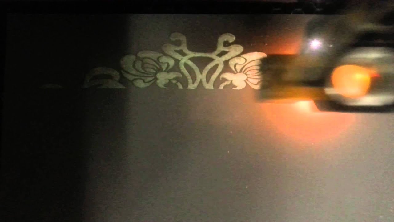 CO2 Laser burning the backing off of mirror