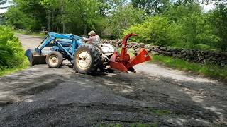 Driveway repair with ford tractor