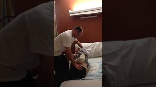 Out of bed to sitting edge of bed, pt with a stroke, left hemiparesis.