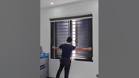 CỬA NHÔM XINGFA KẾT HỢP RÈM CẢN NẮNG VÀ LƯỚI CHỐNG MUỖI QUYETTAMWINDOW - Lắp đặt tại Quận 4, TP.HCM