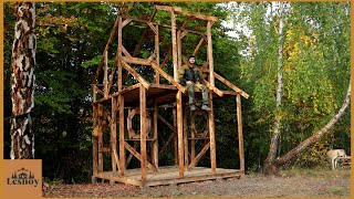 Construction of a twostory house from a tree.  DIY