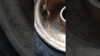 How do you take a valve stem out of a tire without a valve stem tool