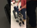 Folding and unfolding a wheelchair