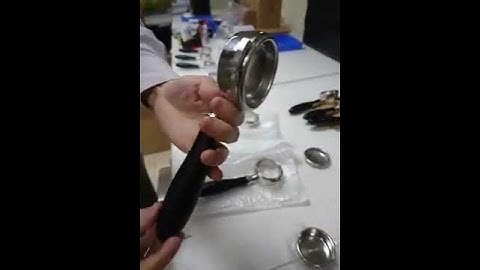 How to loosen a stiff portafilter spring