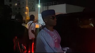 Wizkid’s departure from his mother’s burial in Lagos.  Sad day but he still shares love