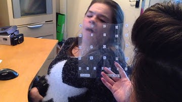 Lisa uses her EyeLink communication system to introduce herself