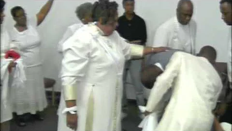 Laying Hands...Pastor Cynthia Moore & Apostle Levi...