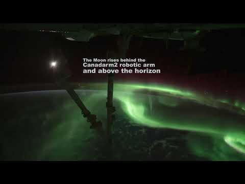 This time-lapse video shows an orbital pass above an aurora-draped Indian Ocean