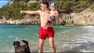 Daddy, Baby, and Dog Enjoying Fetch at The Beach