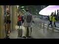 Passengers at Madrid airport as EU mulls blocking UK flights over new virus strain | AFP