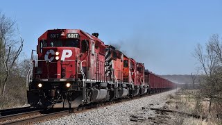 Chasing Three CP SD40-2's on a Ballast Train