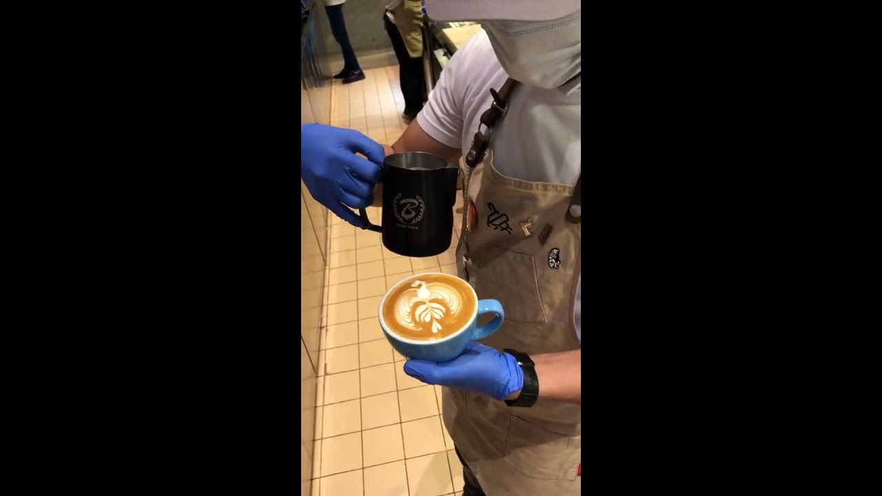 Phoenix latte art in Acme cup