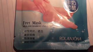 Milk And Bamboo Vinegar Peeling Foot Mask On Hubbys Feet