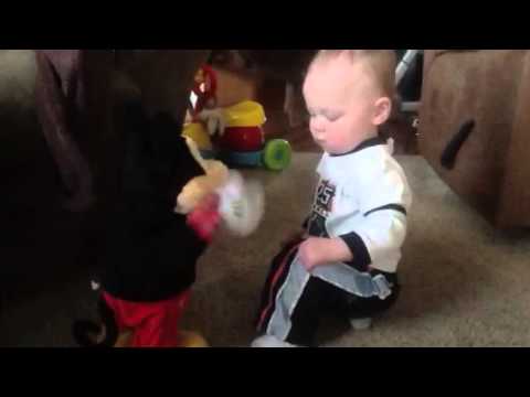 Getting down with his pal, Mickey