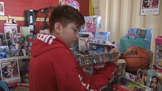 Kids and families find holiday cheer in toy giveaway
