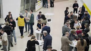 Group of people having coffee break during conference