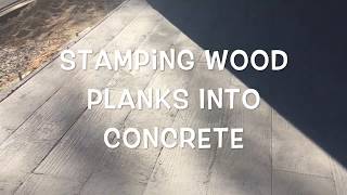 Stamping wood planks into concrete