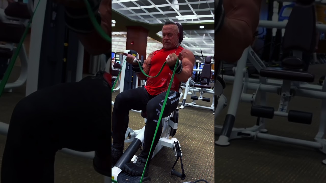 After your next set of machine curls, superset it with some resistance band curls to get everything
