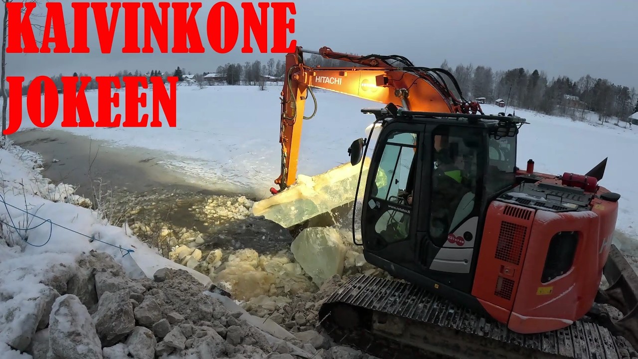 Kaivinkone jokeen. EXCAVATOR ON AN ICE RIVER IN THE ARCTIC CIRCLE.