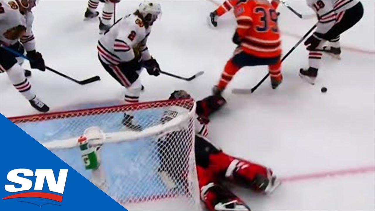 Corey Crawford Keeps Making Wild Saves But Leon Draisaitl Finally Scores