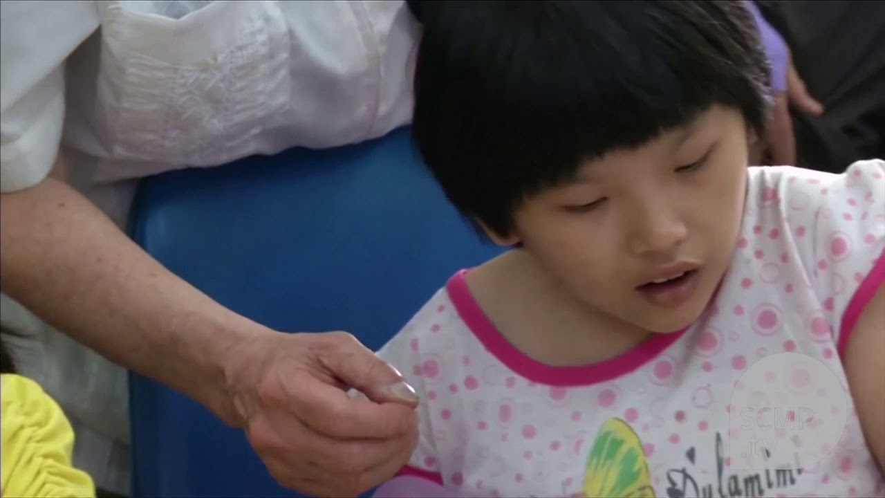 US war veterans tour Agent Orange victims center in Vietnam