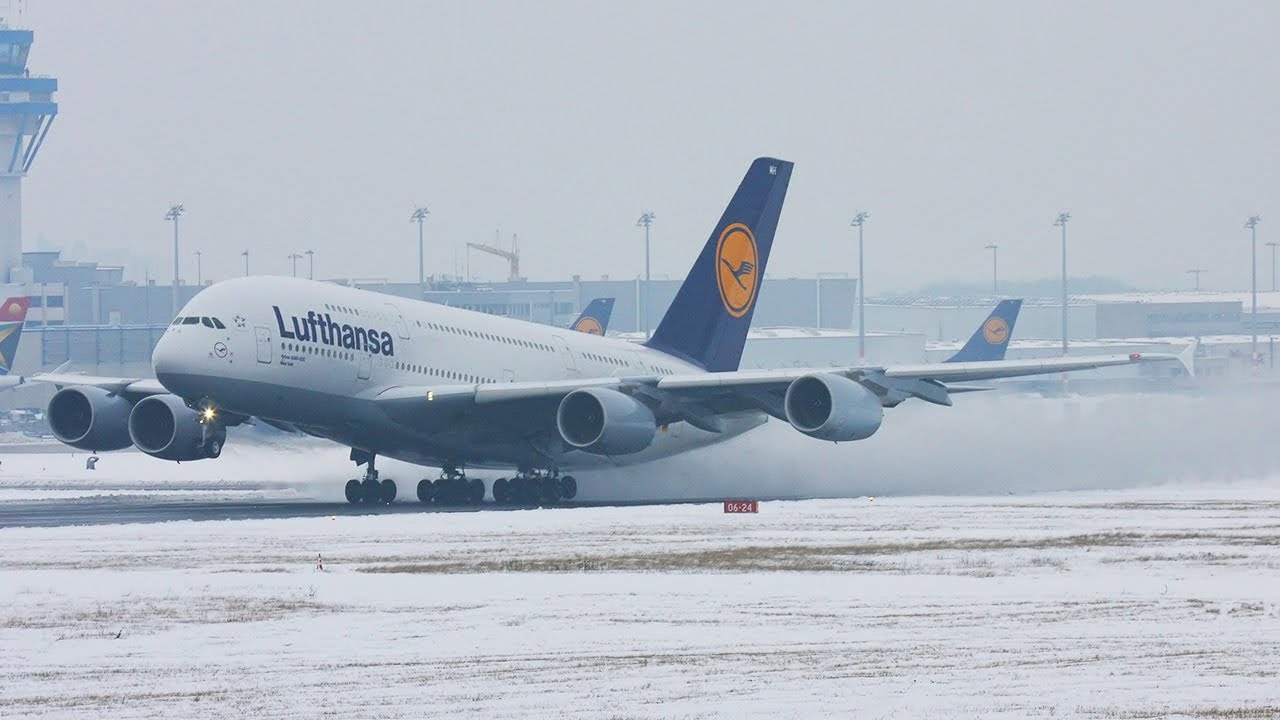 Airbus A380 Snow departure. Lufthansa A 380 creating a snow storm (HD)