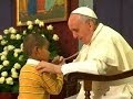 World enchanted by boy who stayed at Pope's side