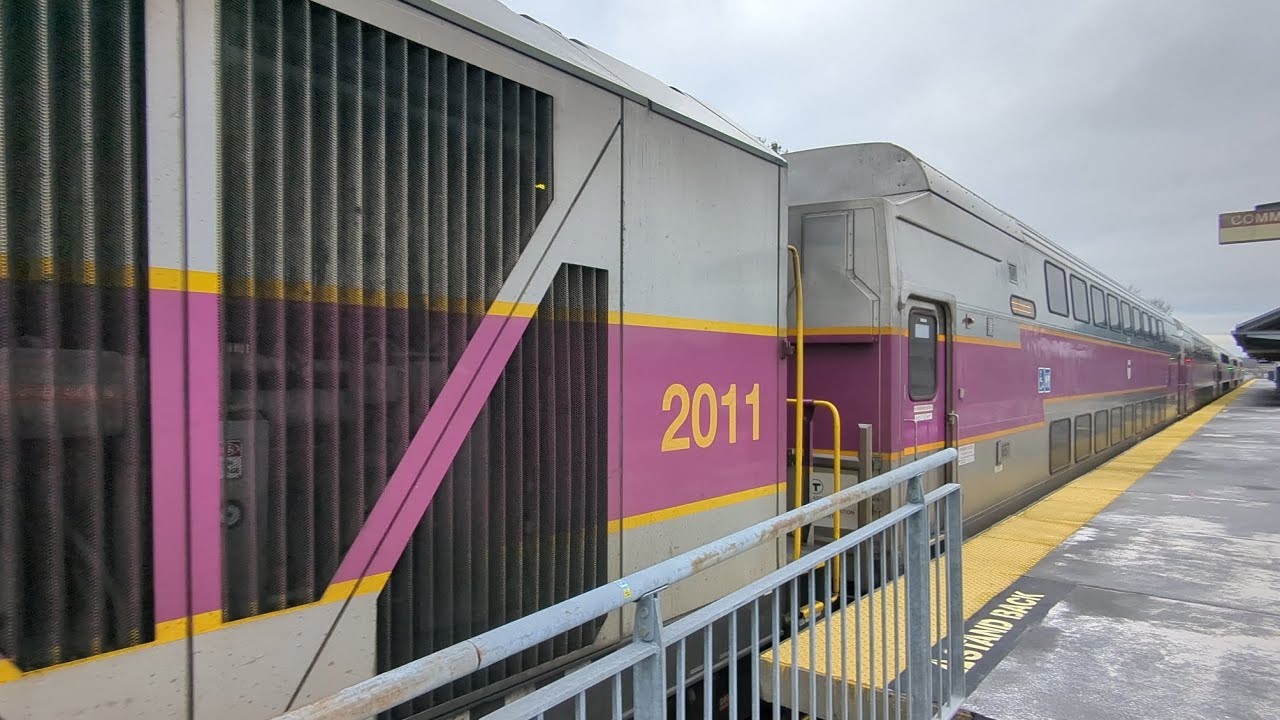 South Station bound commuter rail train enters braintree station with a