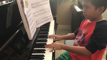 Mark playing " The Syncopated Music Box " piano / Alfred