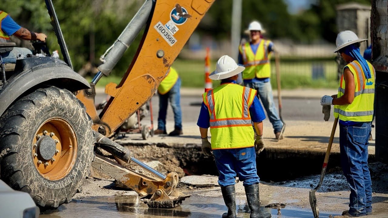 Vehicle falls into hole in street after water main break on Northeast Side, SAWS says