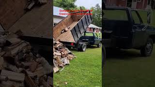 dumping a cord of wood with custom made diesel dump truck